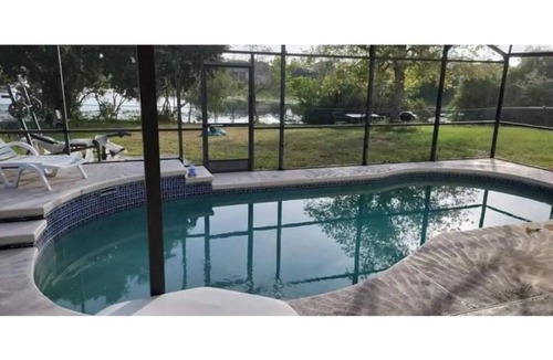 Indian Wells House | Cozy lake house with private heated pool near Disney