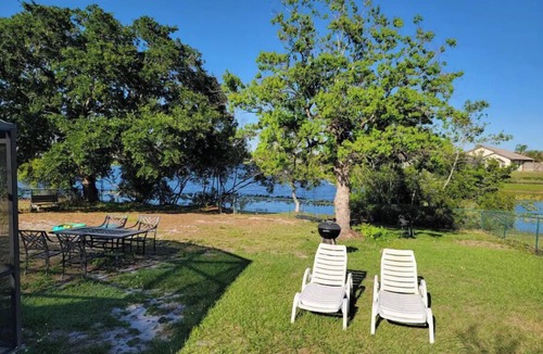 Indian Wells House | Cozy lake house with private heated pool near Disney
