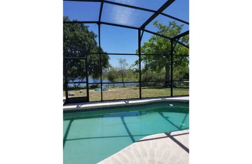 Indian Wells House | Cozy lake house with private heated pool near Disney