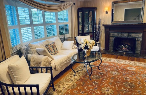 Cathedral Garden House | Cozy Oasis with Pool & Fireplace