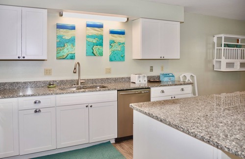 Rehoboth by the Sea House | Dewey Beach 4BR Condo Ocean Block w/Parking, Outdoor Shower