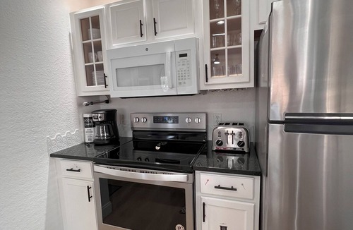 Venetian Bay Villages Villa | DISCOUNTED! Magnolia House 8pp 4bd-3ba Disney Universal