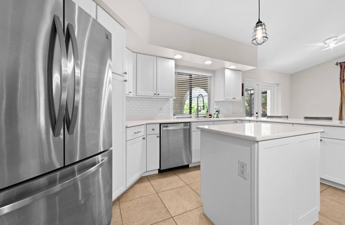 Burnt Store Isles House | Dog-Friendly Canal-Front Home with Heated Pool, Dock, Screened Lanai & Free WiFi