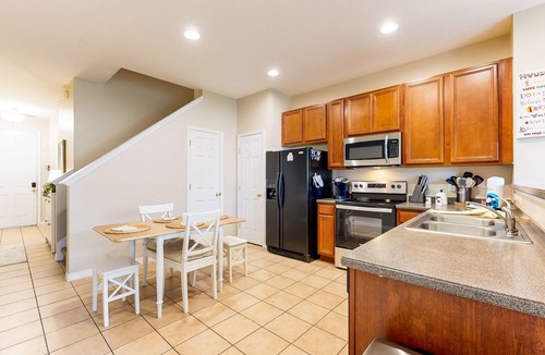 Crestwynd Bay House | Dog-friendly townhouse near Disney with outdoor pool, patio, streaming, W/D, AC