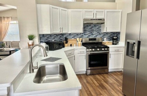 Crescent Lakes House | Dreamy Lakeview Villa with Heated Pool BBQ Family Friendly Near Disney