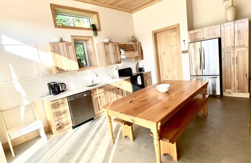 Britt Cottage | Duplex style cottage, 2 kitchens! Nestled in quaint area on River. Dock access!