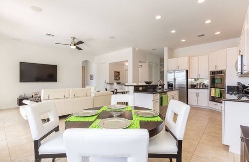 Wilton Manors House | Eco-friendly 100% solar home with 42 ft salt water, lap pool/spa on new river
