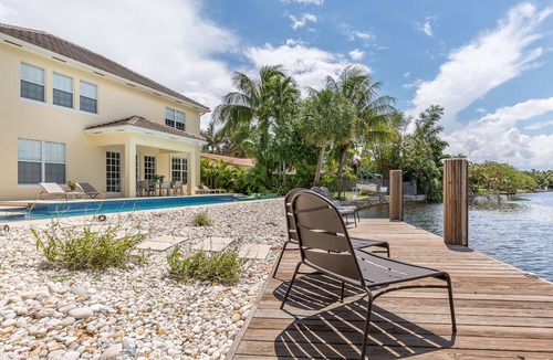 Wilton Manors House | Eco-friendly 100% solar home with 42 ft salt water, lap pool/spa on new river
