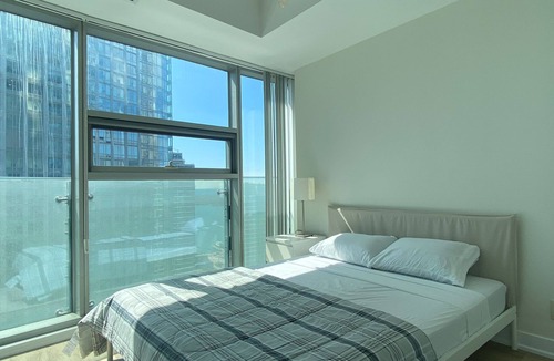Central Waterfront House | Elite Urban Lodgings | Executive Escape