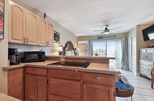 Bay Esplanade Apartment | Enchanted Inn Suite #6 w/View of the Intra-costal water-way Pool, Fishing Dock,