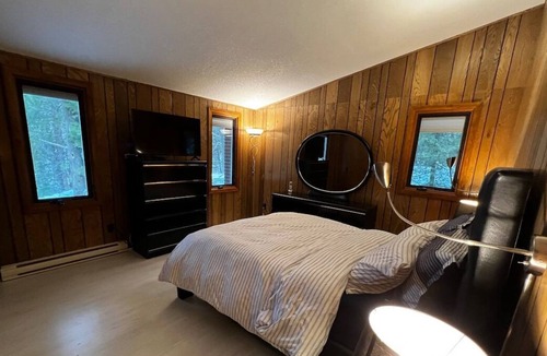 Port Franks Cottage | Escape to the Forest: Beach Access, Jacuzzi, and Cozy Fireplace