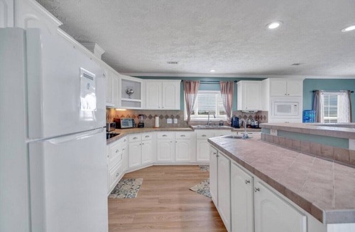 Lake Catherine House | Family Friendly Waterfront Home | Private backyard