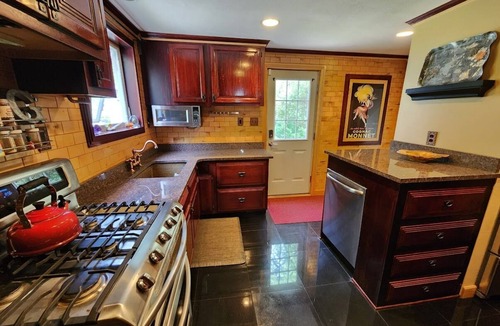 Craigsville House | Forty Acre Retreat. Wooded trail. Outdoor retreat with unique custom interior.