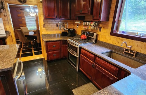 Craigsville House | Forty Acre Retreat. Wooded trail. Outdoor retreat with unique custom interior.