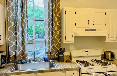 Faubourg Livaudais Apartment | Garden District Victorian off historic St. Charles Ave.