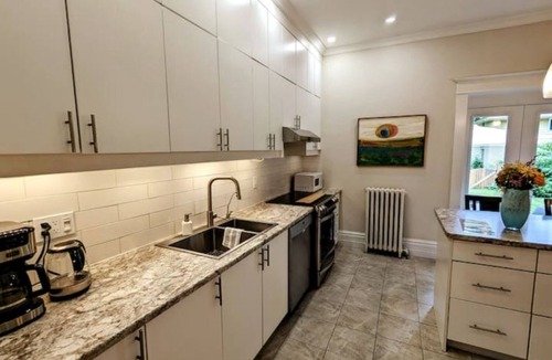 Exhibition Park House | Garden Paradise: Century Home in Guelph's Heart