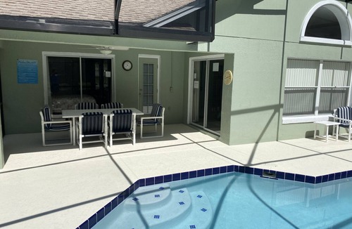 Kissimmee House | GORGEOUS POOL HOME IN QUIET TRANQUIL SETTING CLOSE TO ATTRACTIONS & OUTLETS