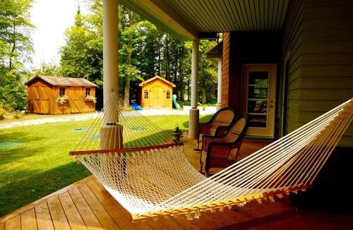 Chatsworth House | Grace House - an elegant retreat on a private lake. Swimming pool. Five bedrooms