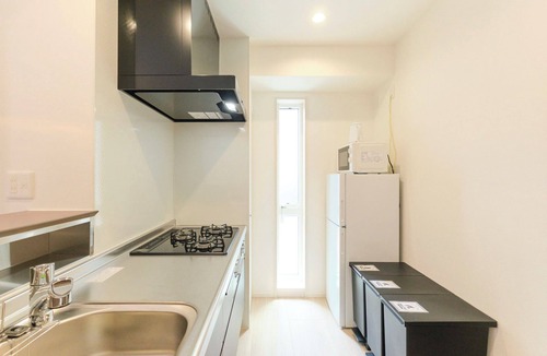 Ota Apartment | Grand Grace Zoshiki by Tranova
