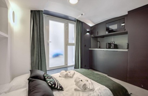 Palais-Royal Apartment | GuestReady - Cozy Souplex in front of Palais Royal