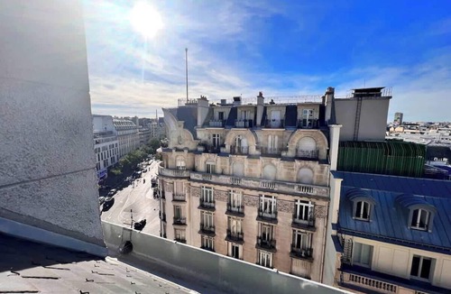 Quartier du Faubourg-Montmartre Apartment | Habitat Parisien -1BR-1BA with Parisian rooftop view