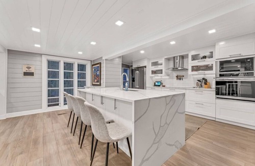 Merritt Island House | Heated Pool, Sleeps 21, 2 Kitchens, Custom Firepit, Outdoor Oasis, Near Beach
