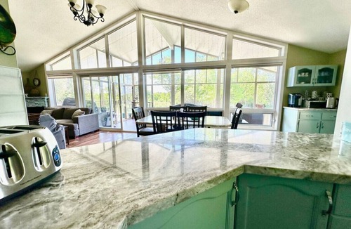 Grey Highlands House | Hillside Haven Retreat: Sunroom & Pond Escape