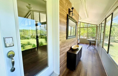 Grey Highlands House | Hillside Haven Retreat: Sunroom & Pond Escape