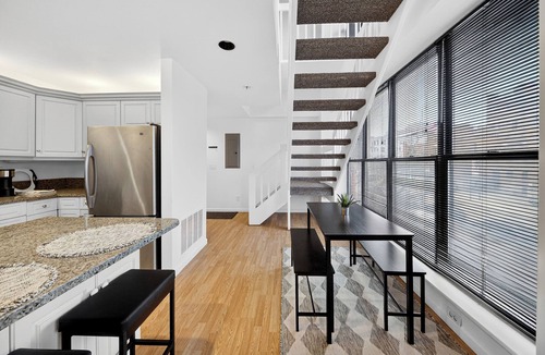 Downtown Syracuse Condo | Historic Armory Square Stay with Private Outdoor Space