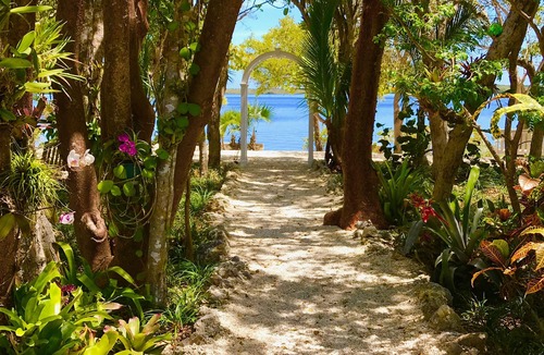 Anglers Park House | Historic Waterfront Home - 2 acres- Dock, Garden -Beach in Key Largo sleeps 16