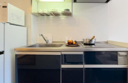 Ikebukuro Apartment | ISSHUKU NOMA池袋II 302 - Quad Room