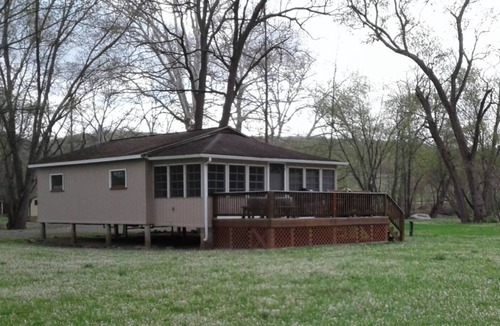 Fishertown Cottage | KD Cottages Private 2-bedroom tan cottage on Dunnings Creek, in Bedford County