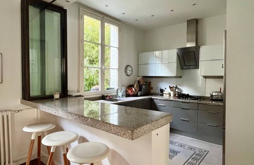 15th Arrondissement Apartment | "La Belle Époque: A Glamorous 1930s Art Deco Mansion with garden &Summer Lounge"