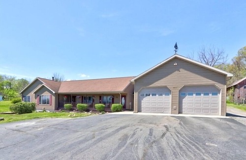 Town of Milo House | Lake front 7-bedroom house with movie theatre, hot tub, and game room!