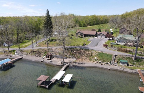 Town of Milo House | Lake front 7-bedroom house with movie theatre, hot tub, and game room!