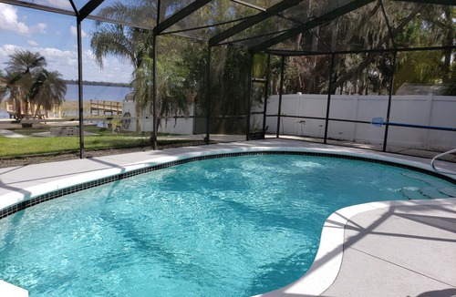 Haines City House | Lake Front Country Pool Home, 40 minutes to Disney