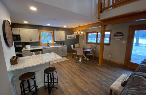 Treasure Lake House | Lakefront 4 Bedroom 2.5 Bath Hot Tub, Firepit, Dock, Deck and great backyard!