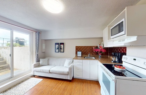 Wasaga Beach House | Lakefront condo steps to the beach with pool, and fireplace