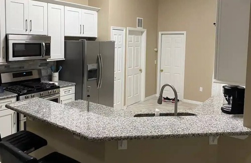 Crescent Lakes House | Lakefront Villa with private heated pool. 30 Minutes from Disney / Universal!