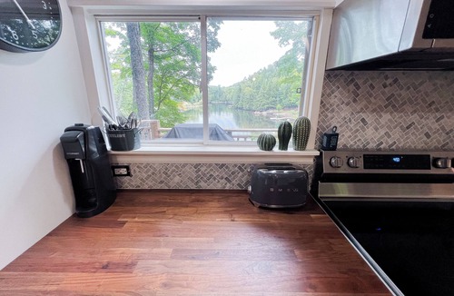 Highlands East Cottage | Lakeside retreat in Highlands East: A 4-season getaway with hot tub