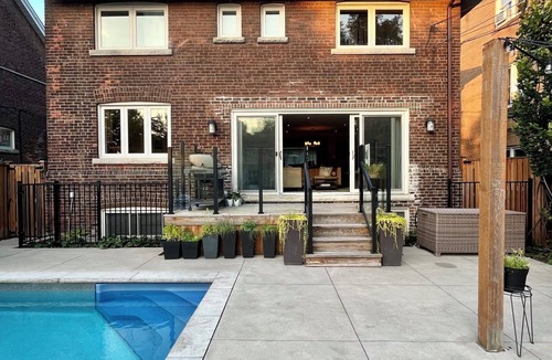 West Bend House | Large Family Home in High Park with Resort-like Backyard with Pool/Sauna