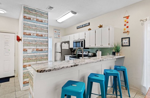 Miramar Beach House | Lovely Beach House with a large Playroom steps to Pool and 5 mins walk to Beach
