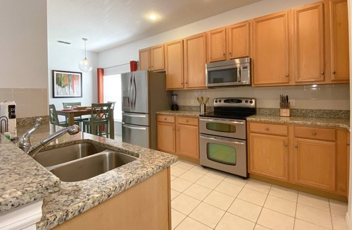 Crescent Lakes House | Lovely modern 4bd POOL and SPA home. Near Disney, parks, restaurants!