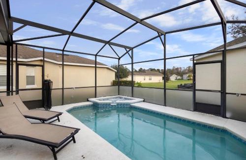 Trafalgar Village House | Lux 4BrVilla Hot Tub Grill Private Heated Pool