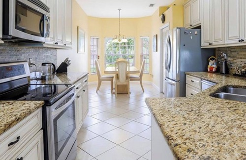 Champions Villa | Luxurious home with stunning golf course views and private swimming pool & spa