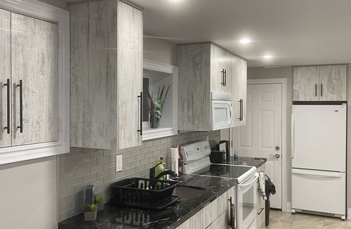 Rosemount House | Luxury & cozy 2 bedroom basement unit with own entrance