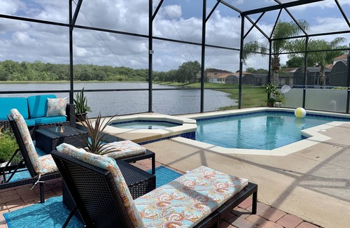 Buena Ventura Lakes House | Luxury Lake Home near parks and MCO airport. Private Pool and spa. Themed rooms.