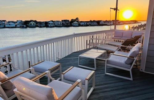 Caine Woods House | Luxury Waterfront Villa Dock Game Room Sunset Views