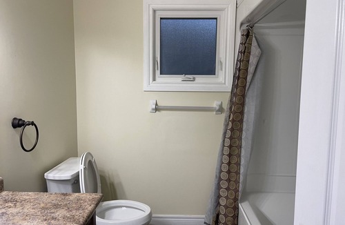 Guelph House | Master Bedroom with ensuite Bathroom & Closet. Kitchen and living are shared.