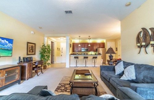 Florida Central Atlantic Coast Condo | Minutes to everything. Desirable Ground Floor Condo in Vista Cay |Lanai |Across from Epic Universe